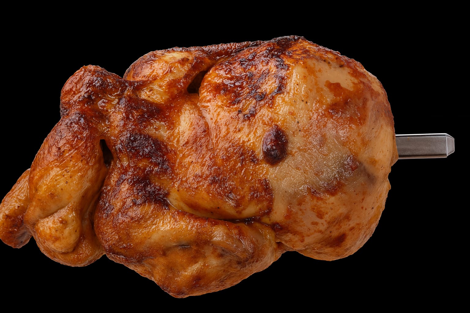 Pollo al horno de leña dorado y jugoso en Asador Pollos Oasis, Oropesa del Mar